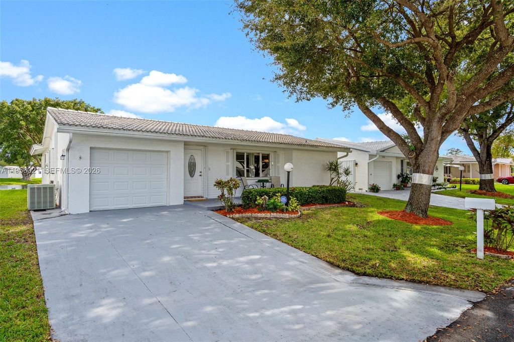 Photo of 1110 NW 90th Way, Plantation, FL 33322 (MLS # A11956321)