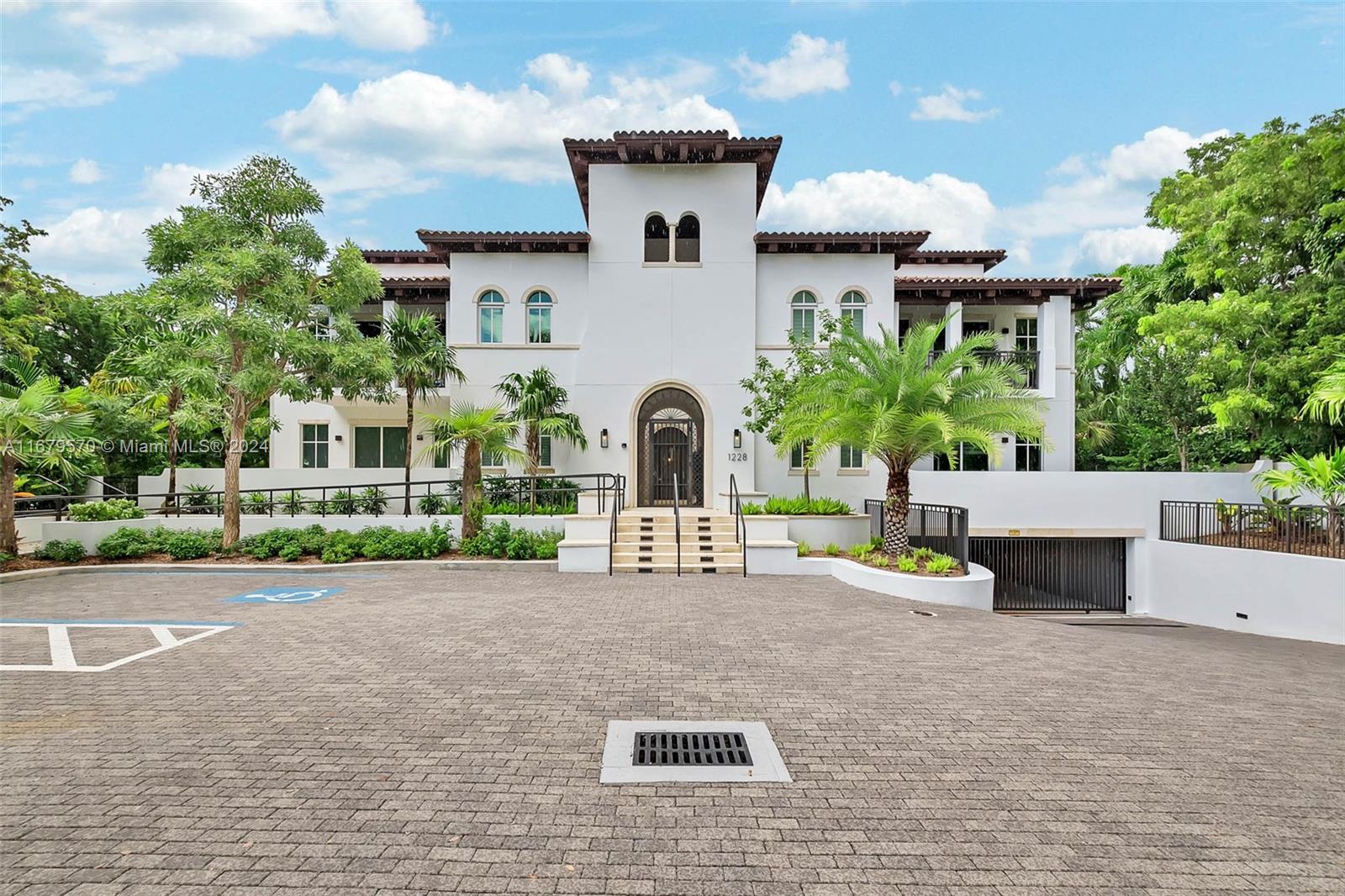 Luxurious and exclusive 2021-built condo next to the Biltmore Hotel in the heart of historic Coral Gables. Open living and dining rooms overlook the chef’s kitchen complete with Wolf and Subzero appliances, built-in espresso machine, wine cooler and eat-in snack bar. Grand primary suite with spacious walk-in closet and lavish bath with soaking tub and glass enclosed shower. Two guest bedrooms en-suite. 4th bedroom is currently used as an office with built in bookshelves. Matte porcelain floors. Lovely balcony with treetop views, electric grill and sink. Private elevator, 3 assigned and gated parking spaces, one electric car charger and secure storage unit. Amenities include a dipping pool and back-up generators.