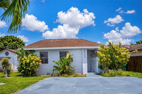 Photo of 5095 NW 195th Ln, Miami Gardens, FL 33055 (MLS # A12066747)