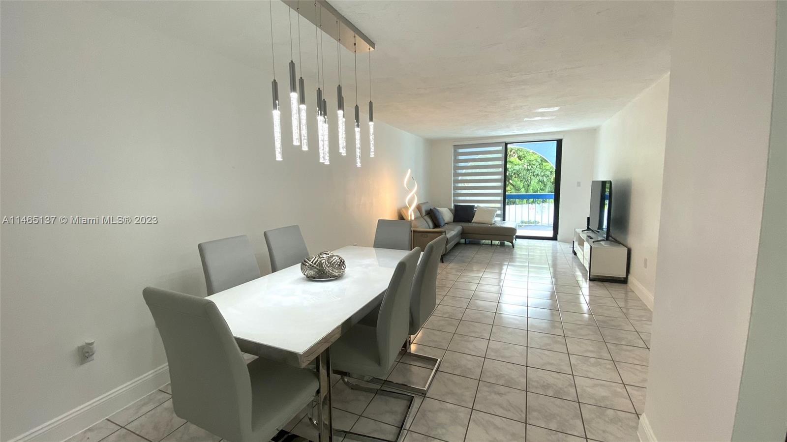 Discover a stunning 2-bedroom, 2-bath condo in the serene Bleau Grotto community. Your view overlooks the inviting pool area, and the interior delights with updated bathrooms, impact windows, sliding glass doors, zebra blinds, and blackout shades in the bedrooms. Luxurious LED bathroom mirrors enhance your daily routine. With abundant storage and two unassigned parking spaces, convenience reigns. This well-appointed building offers an elevator, a common laundry facility on each floor, tennis courts, a sparkling pool, a fitness center, and a welcoming clubhouse. Moreover, its central location ensures easy access to major expressways, making this condo the perfect gateway to your ideal lifestyle.