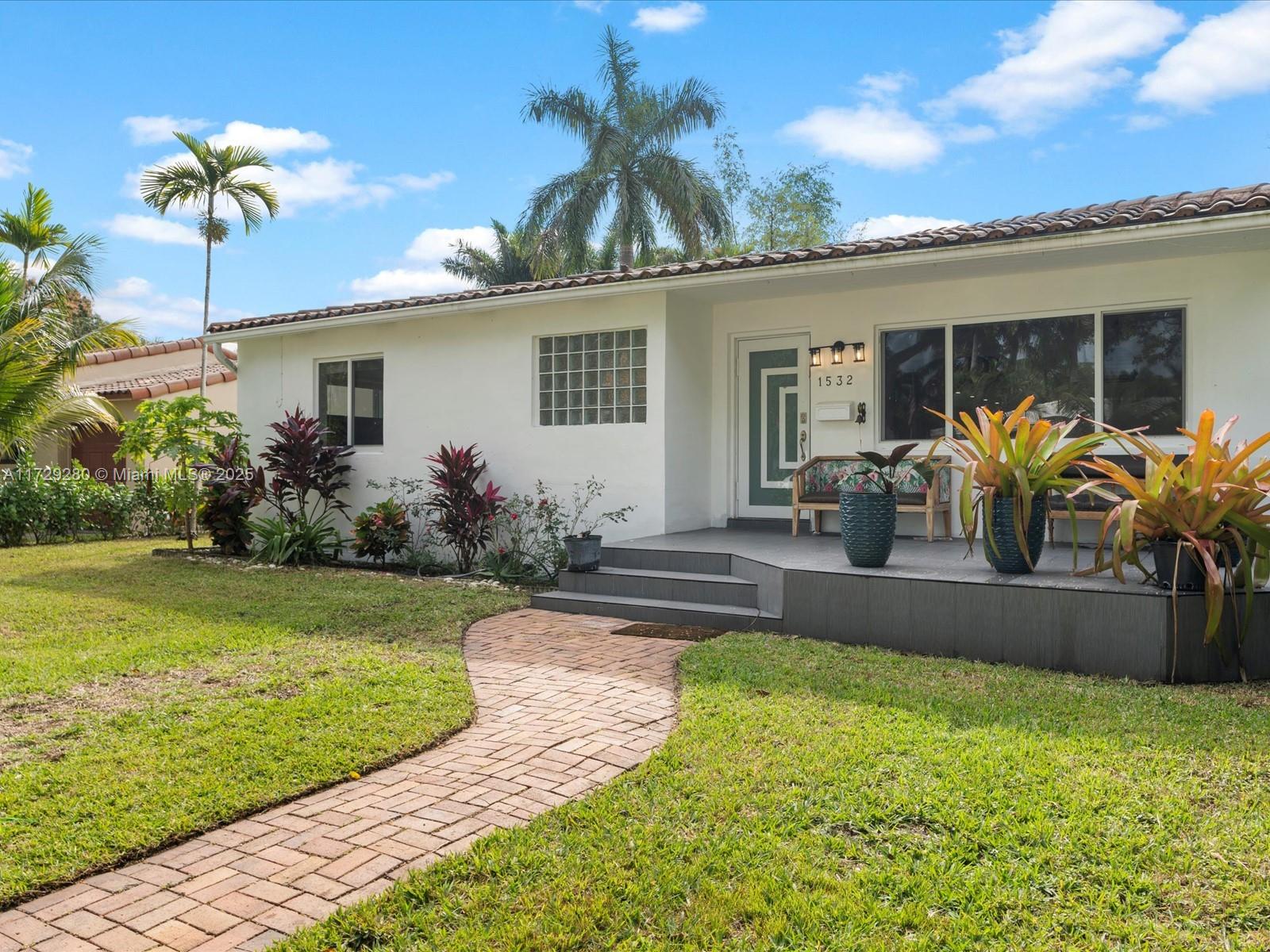 This charming 3 bedroom, 2 bathroom home in the heart of Hollywood is a true gem! Boasting natural light throughout with hurricane proof windows, oak wood and tile flooring, this home provides ultimate comfort. The kitchen features granite countertops and a convenient bar area, along with an oversized family/dining perfect for entertaining. The spacious backyard is primed for a pool, offering endless possibilities for outdoor relaxation and entertainment. Best of all, you're a short 6 minute drive from the beach!
