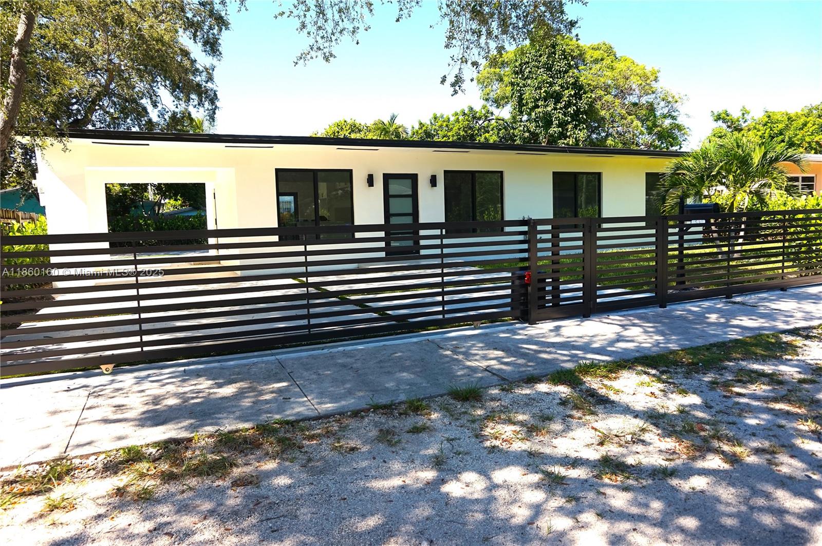Step into modern living on this renovated 3-bedroom, 2-bathroom home located just minutes from Miami’s world-famous Design District, Wynwood, beaches, Brickell, and a short drive to Aventura mall. This neighborhood is quickly emerging as the city’s next hotspot, offering modern living with unmatched convenience. The home features a brand-new roof, new A/C, fully renovated bathrooms, elegant porcelain floors, quartz countertops, and appliances to be installed before closing. With sleek modern design, private gated entry, and a spacious backyard, this residence delivers the “New Design District” lifestyle you’ve been waiting for. Enjoy easy access to shopping, dining, nightlife, and top cultural destinations, all while living in a private retreat perfect for entertaining or relaxing.