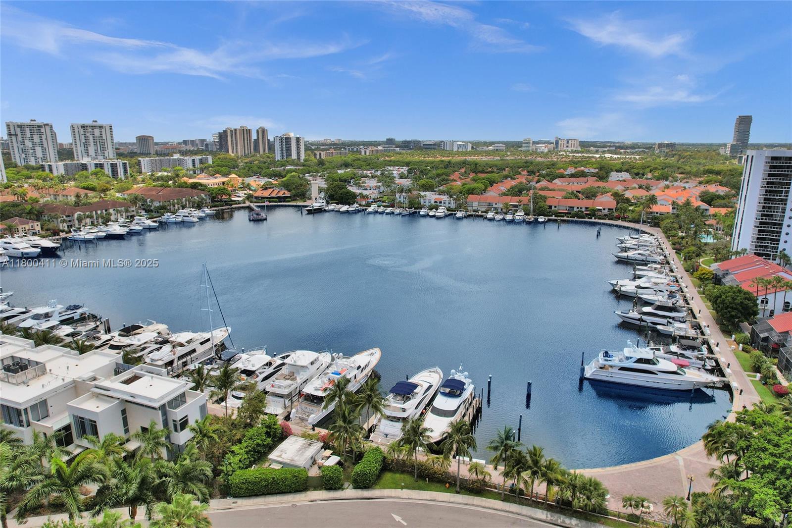 Totally unobstructed panoramic views from this bright and spacious condo. 2 split bedrooms, 2 baths. Views of the Marina at the Waterways & beautiful sunsets. 1505 sq. ft. Large walk-in closet. Full size washer and dryer. Resort lifestyle amenities included in the maintenance: 3 pools, tennis courts, 25,000 sf spa, fitness center & clubhouse. Outdoor café, BBQ area & kids' playground. Walking distance to restaurants and shops. 10 minutes to The Beach. 24-Hour security and Valet parking.