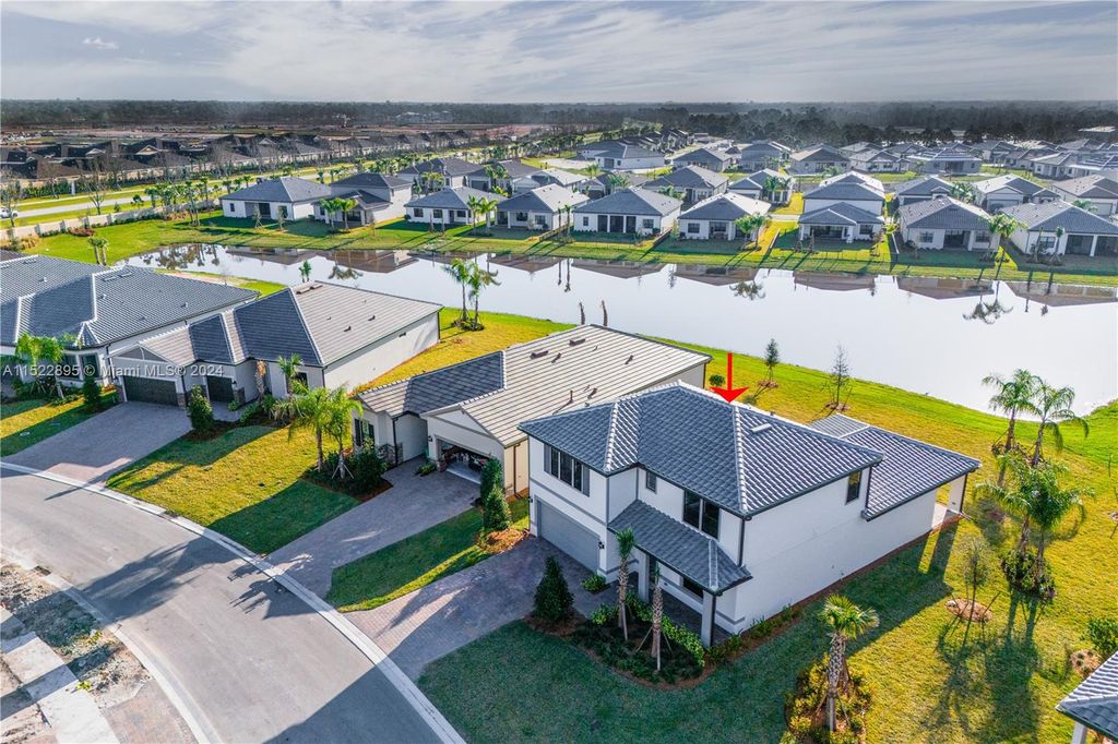 Photo of 427 SE Vallarta Dr, Port Saint Lucie, FL 34984 (MLS # A11522895)