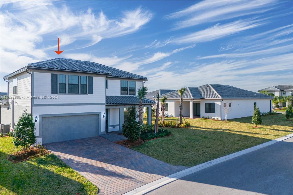 Photo of 427 SE Vallarta Dr, Port Saint Lucie, FL 34984 (MLS # A11522895)
