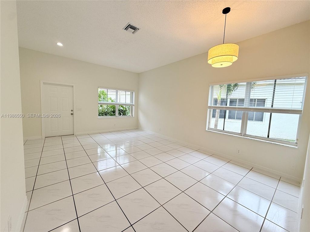 Photo of 964 Tanglewood Cir, Weston, FL 33327 (MLS # A11986550)