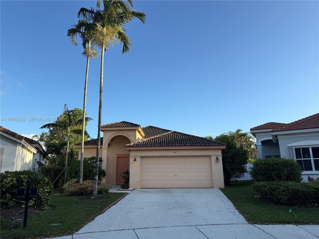 Photo of 964 Tanglewood Cir, Weston, FL 33327 (MLS # A11986550)