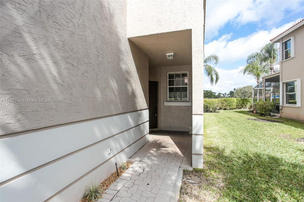 Photo of 10241 Via Hibiscus, Boca Raton, FL 33428 (MLS # A11527589)