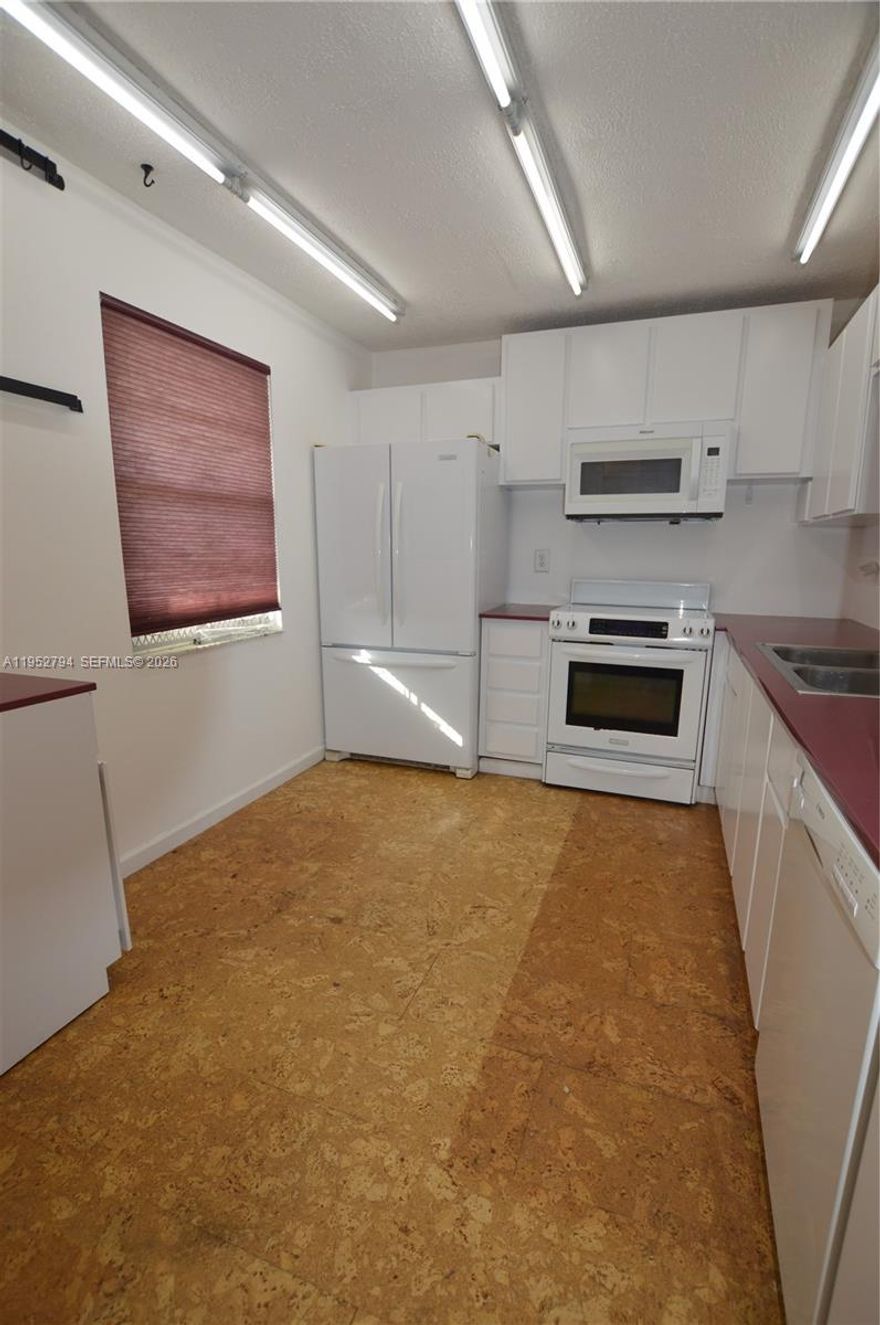 Welcome to Meadowbrook Lakes, a sought-after 55+ community in Dania Beach! This bright, inviting unit features peaceful lake and clubhouse views. The Unit has several walk in closets and large bedrooms. The unit is located in a well managed building with low maintenance costs. The building has a newer roof and elevator. The building was painted and sealed a few years ago. The building passed the 40 year inspection.  Unit has tiles floors, update bathrooms and kitchen.  The building is situation very close to major attractions including the beach, Ann Kolb Nature  Center (preserved land), Hollywood Beach boardwalk and Dr. Von D. Mizell-Eula Johnson State park. Convenient shopping and dining in the area.  Move in to this great unit for a fantastic Florida life.