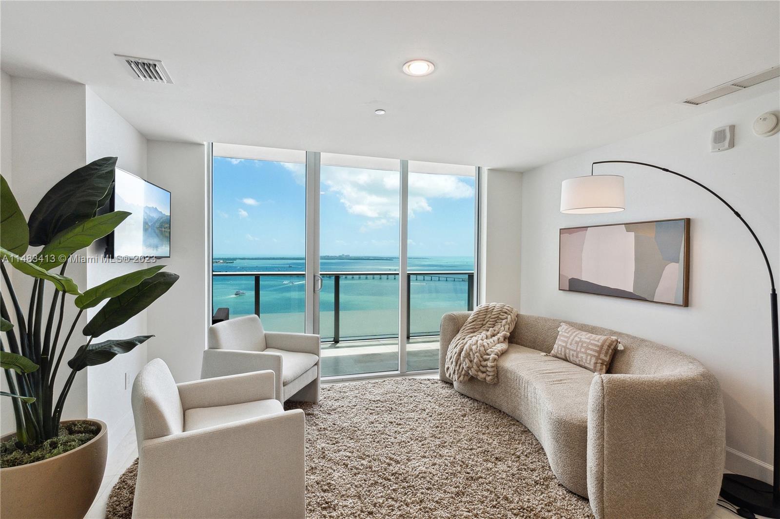 A Chic Coastal Retreat! Steps away from the city's most acclaimed restaurants, Brickell House is known for cultivating calm in the middle of an Urban Oasis. This TURNKEY 2-Bedroom + DEN residence rises high above one of the premier addresses in Brickell with panoramic views of Biscayne Bay. Every detail has been carefully curated to embody the finest that tropical luxury can offer. Indulge in an expansive range of amenities to elevate your living experience with a sun-drenched rooftop pool, a peaceful sunset lounge pool, a fitness center, a movie theater, a children's playroom, a summer kitchen, and a lounge area ideally suited for a communal workspace.