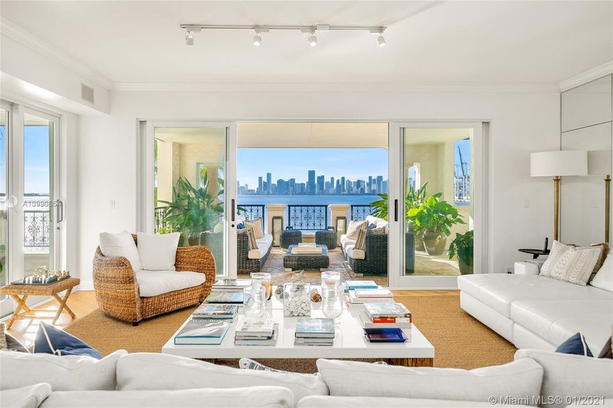 This stunning contemporary 4BR/4+1BA Bayview corner unit offers 4,010 SF of luxury, & 4 terraces w/amazing direct views to the downtown Miami skyline, Biscayne Bay, Virginia Key, over Fisher Island & Miami Beach. Unit features wide plank engineered oak wood floors, spacious open living room w/bar & separate dining area surrounded by walls of glass w/direct access to the bayside terrace. The gourmet kitchen sports a center island, brand new top-of-the-line Sub-Zero refrigerator/freezer, Wolf cooktop, wine chiller, plus custom cabinetry & separate breakfast area. Spacious private principal suite w/large new walk-in closet, premier Stark carpeting & principal bathroom w/walk-in rain shower & sunken spa tub. 3 other BRs are each spacious w/en-suite bathrooms. 5-star Fisher Island amenities.