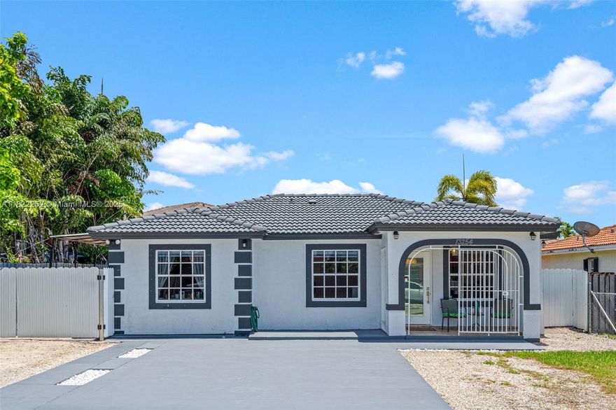 Price adjustment! Discover this well-maintained 3-bedroom, 2-bathroom home tucked away on a quiet cul-de-sac in a prime Homestead location. Just minutes from the Turnpike, Airbase K-8 school, Amazon, Walmart, Publix, and a variety of shopping and dining options. This move-in-ready home offers both comfort and convenience.

Enjoy South Florida living in the expansive covered back patio—perfect for outdoor gatherings, BBQs, and relaxing year-round. The property also features covered side parking ideal for a boat, trailer or RV. With no HOA restrictions, you’ll have the freedom to make this home your own. Don’t miss this opportunity!