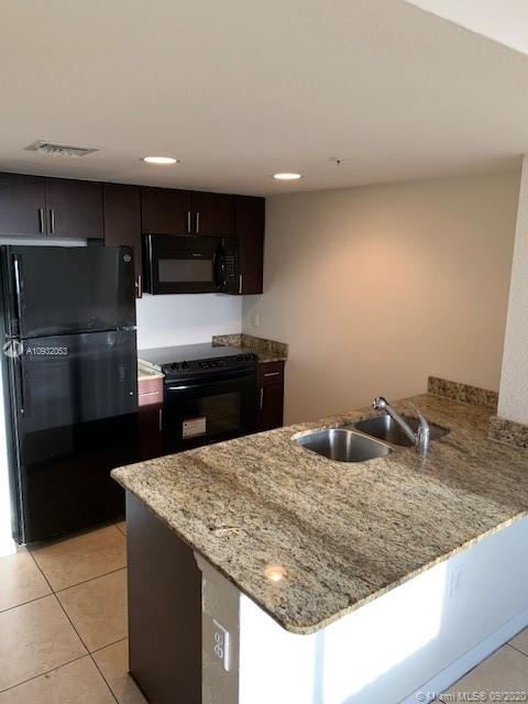 Allapattah Place is a new contemporary residential building located in the heart of Miami's Allapattah neighborhood. This cozy unit provides brand new black kitchen appliances, including an in-unit washer and dryer! Beautiful kitchen and bathrooms with dark wood cabinets and granite counter tops. Unit is tiled throughout. Comes with 2 parking spaces!! This is a must see! Special promo available NOW!