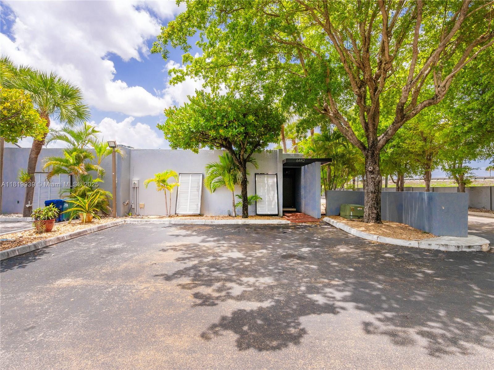 Discover the best-priced townhouse in Miami Lakes! This mint-condition 2 bed, 2 bath gem is located in the sought-after Windmill Gate community. Featuring double primary suites, open kitchen, washer/dryer and a private patio and fenced yard—perfect for relaxing or entertaining. Low HOA Fee of $975 per year.