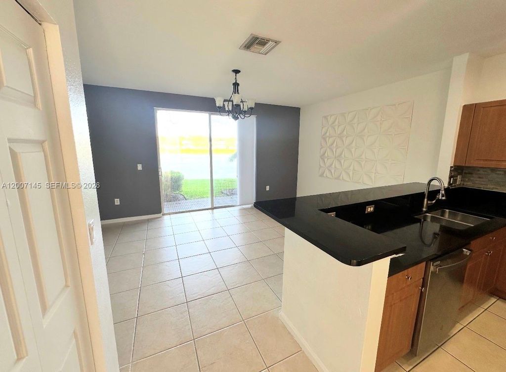 Photo of 2641 SW 83rd Ave #102, Miramar, FL 33025 (MLS # A12007145)