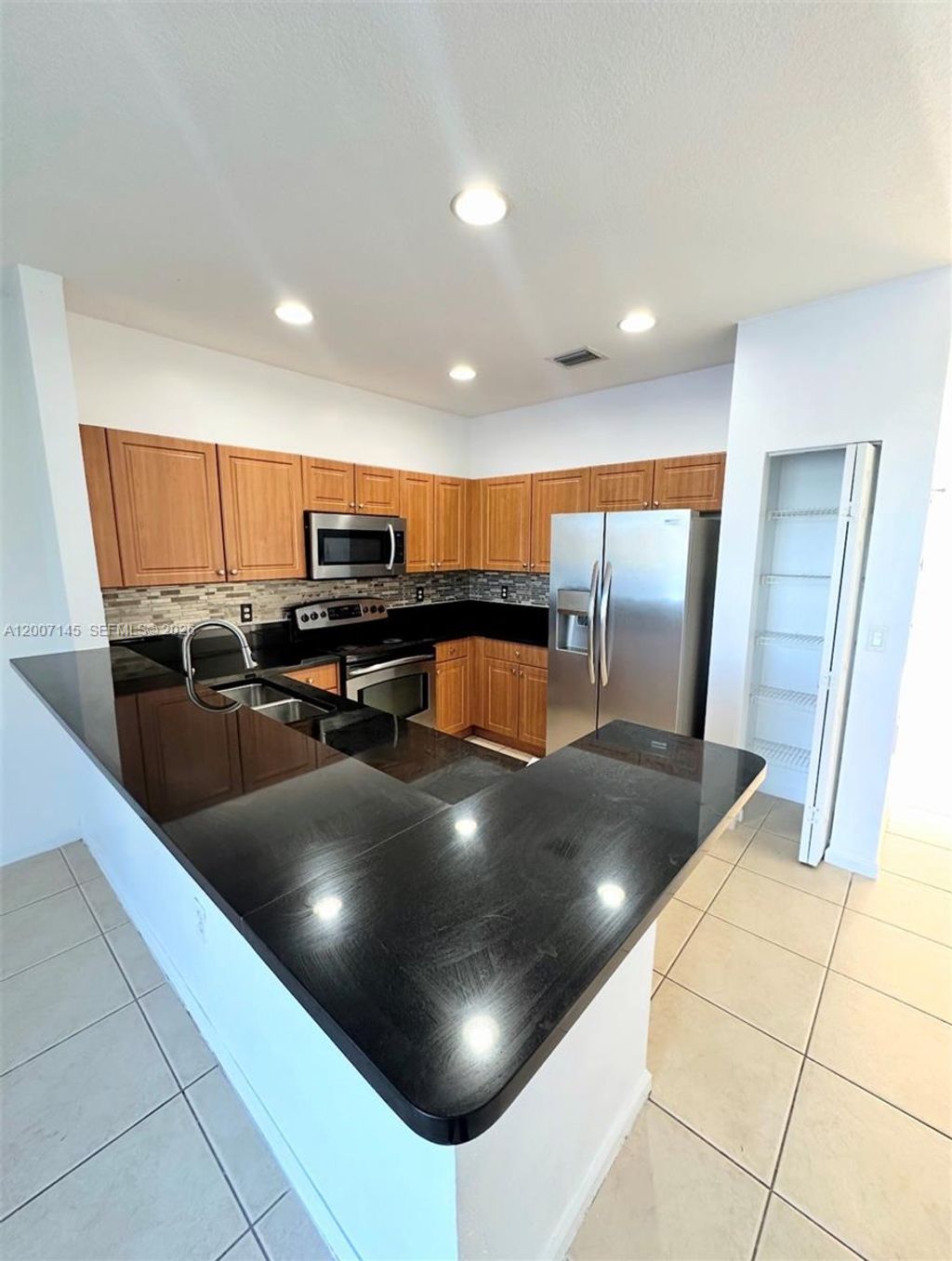 Photo of 2641 SW 83rd Ave #102, Miramar, FL 33025 (MLS # A12007145)