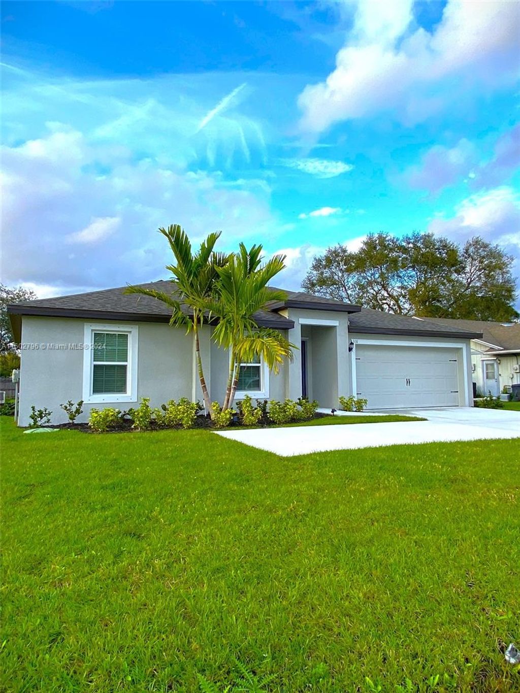 Photo of 331 SW Thornhill Dr, Port Saint Lucie, FL 34984 (MLS # A11602796)