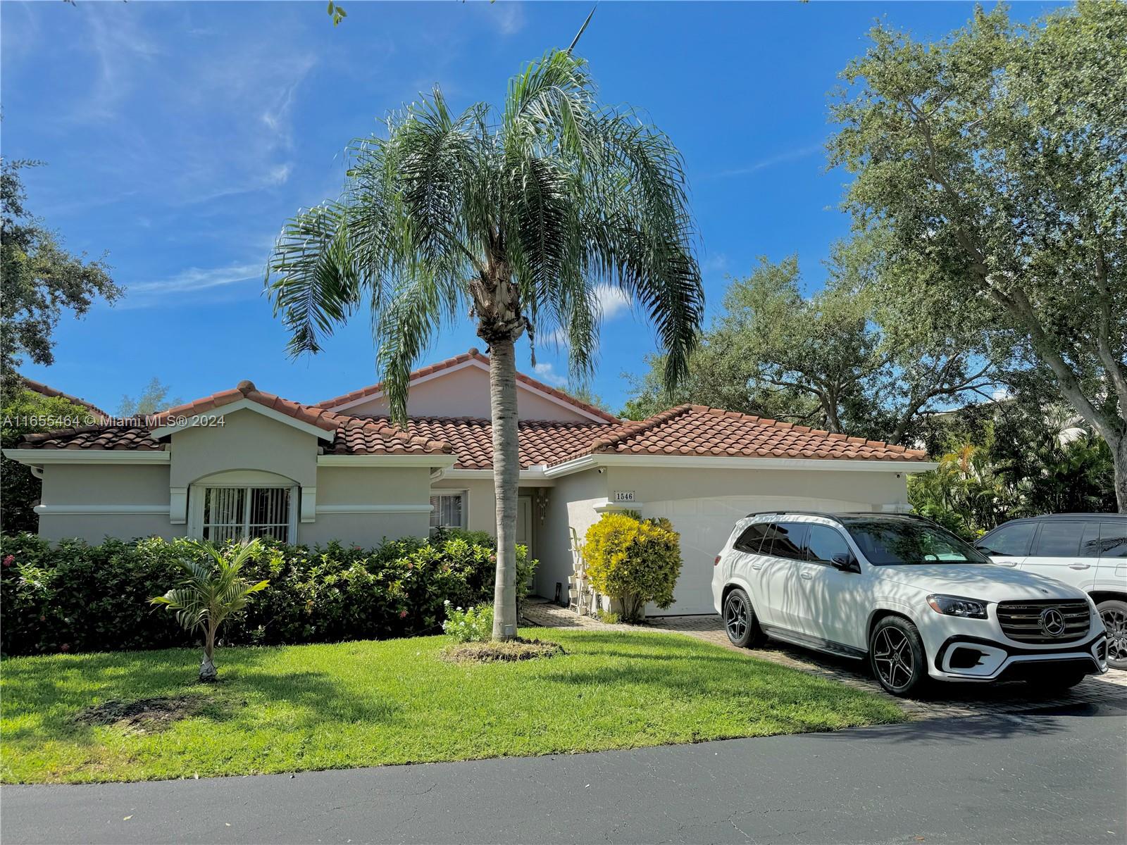 Discover the epitome of waterfront living in this rarely available, single-story home, tucked away in a private, gated community. Elegantly renovated, this residence boasts contemporary charm with porcelain floors, an updated kitchen and bathrooms.Enjoy tranquil moments on the screened patio, the perfect setting for relaxation or hosting guests while taking in stunning water views. Embrace a lifestyle of outdoor adventure with nearby West Lake Park's tennis courts, kayaking, and nature trails. Conveniently located near Hollywood Beach and Fort Lauderdale International Airport, this home offers the best of South Florida living.