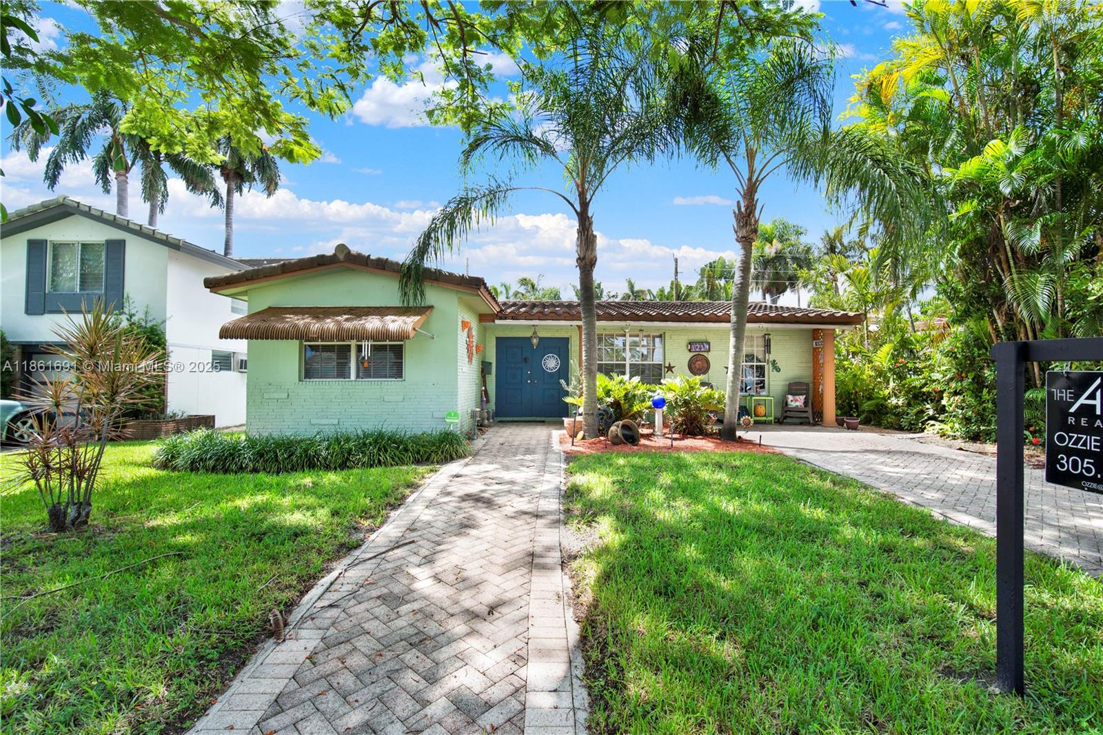 LOCATION, LOCATION, LOCATION. In the heart of Hollywood Lakes, you will find the Best Priced Home in entire area. This beautiful home is located on the same street as the New PGA Golf Course being built as well as a Full-service Boat Marina with ramp to deep water access, 1 block from downtown and Beach with free car service daily to all amenities. This 3-bedrooms, two-bath single-family home offers endless potential. The home features a dining room a large kitchen plus a den/office/family room that opens to large backyard. This home offers perfect blend of comfort and potential to expand and make your own with room for expansion or pool. Very easy to show!