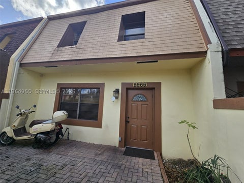 Photo of 5966 NW 24th Ct, Sunrise, FL 33313 (MLS # A11964955)