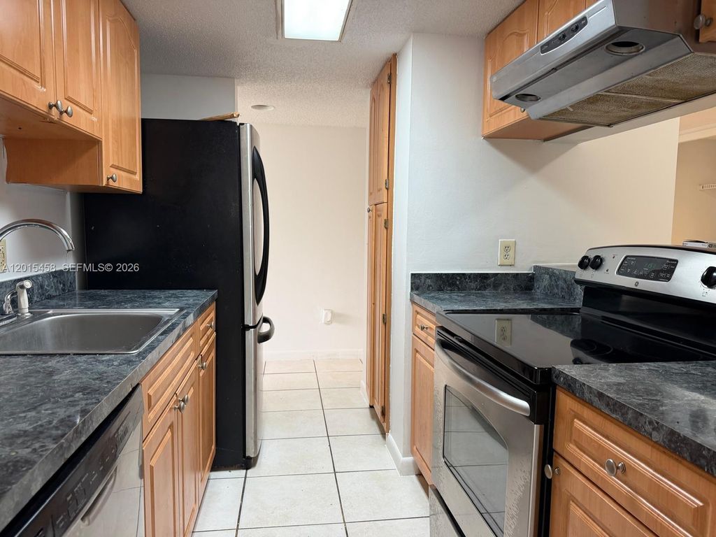 Photo of 4381 W Mcnab Rd #15, Pompano Beach, FL 33069 (MLS # A12015458)