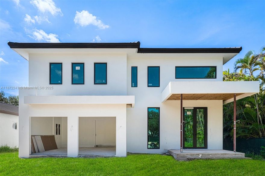 Be the first to own this brand-new 5-bed, 5-bath modern masterpiece, set for completion in Dec 2025, perfect for the holiday season. Situated on a 20,468 sq ft lot, this luxury home features porcelain tile floors, a sleek tube elevator, hurricane-resistant construction, and an EV-ready 2-car garage. The chef’s kitchen boasts Thermador appliances, quartz counters, and custom cabinetry. Upstairs offers a flexible loft and a serene primary suite with balcony, dual walk-ins, and a spa-style bath. The deep backyard oasis includes a pool, summer kitchen, and ample space to relax or entertain.