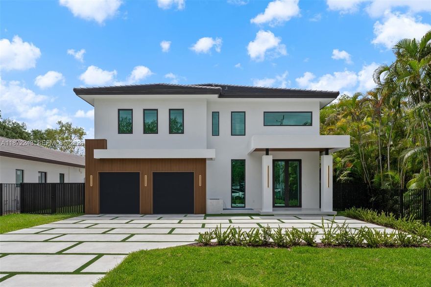 Be the first to own this brand-new 5-bed, 5-bath modern masterpiece set on a 20,468 sq ft lot, with expected completion in March 2026. Thoughtfully designed with exceptional finishes, the home features elegant porcelain tile floors, a sleek tube elevator, hurricane-resistant construction, and an EV-ready 2-car garage. The gourmet chef’s kitchen showcases Thermador appliances, quartz countertops, and custom cabinetry, creating a refined space for everyday living and entertaining. Upstairs, a versatile loft complements a serene primary suite with a private balcony, dual walk-in closets, and a spa-inspired bath. The deep backyard retreat offers a pool, summer kitchen, and expansive space to relax or host guests in style.