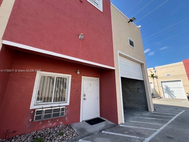 Presenting an exceptional opportunity to purchase a versatile warehouse in a prime location near the Florida Turnpike, US1, and major highways. BEST PRICE & BIGGEST UNIT. This property is perfect for industrial, light manufacturing, or commercial use & is situated in a great area. Low maintenance fees & added privacy of being at the end of a quiet street. The space includes a private bathroom, easy access for loading & unloading, & furnished office featuring modern furniture. 2 assigned parking spaces & additional visitor parking, this property provides excellent convenience. Boasting a total interior area of 1,173 sq. ft. with high ceilings, there’s potential for converting the space into a two-story layout. NO BODYSHOP PERMITTED. Owner Motivated. Just REDUCED $ 25K for a quick sale.