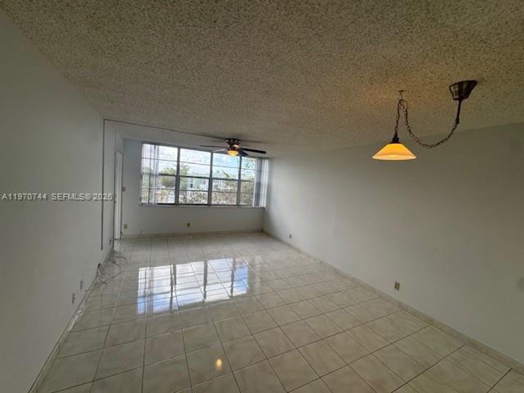 Photo of 2761 Taft St #408, Hollywood, FL 33020 (MLS # A11970744)