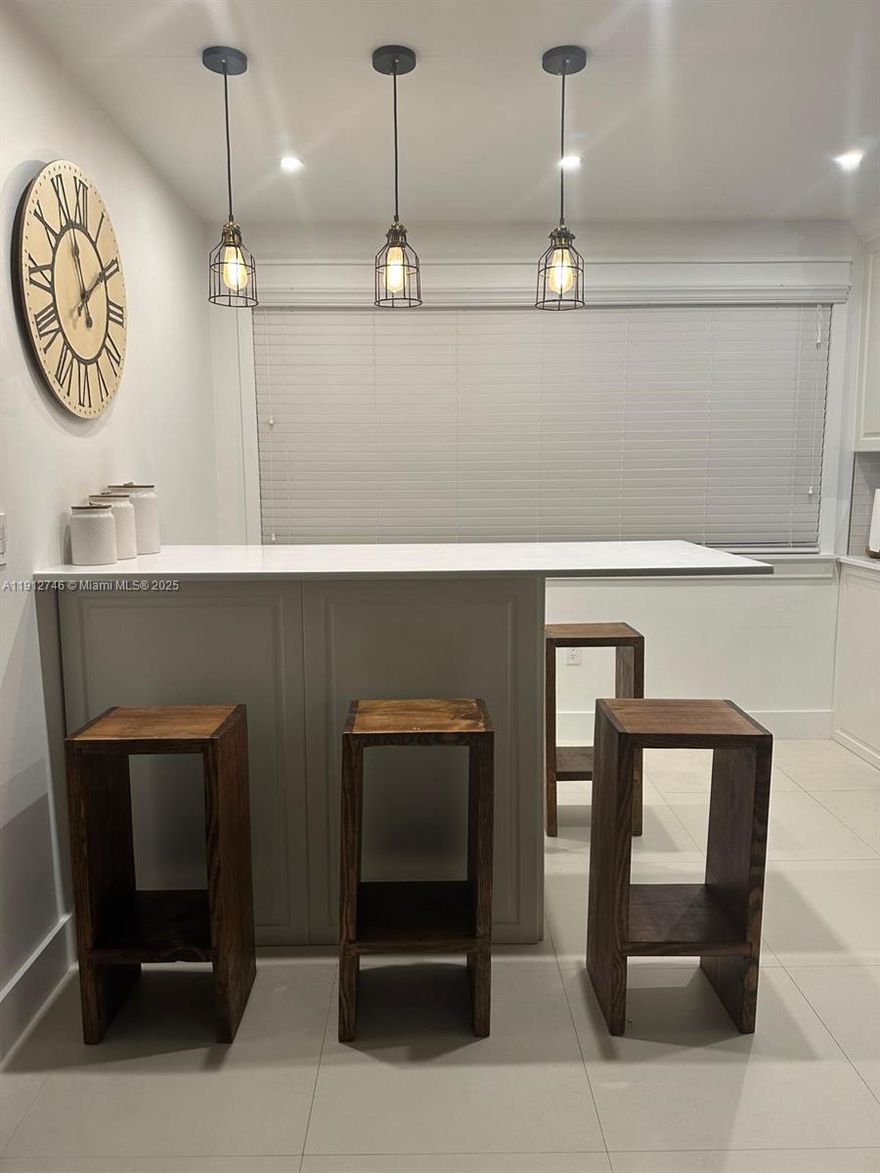 Beautifully updated 2-story condo in the heart of Fontainebleau/Sweetwater! Featuring 2 bedrooms, 2 full baths, and 1,005 SqFt of living space. Enjoy a large fenced private yard, Café kitchen appliances, washer/dryer, and central A/C. Interior highlights include remodeled bathrooms, porcelain tile floors in living areas, bamboo flooring in the master, and wood flooring in the 2nd bedroom. Freshly painted with plenty of storage—3 extra closets + 2 per bedroom. Partially furnished with 2 mounted TVs and kitchen stools. Community offers a pool and tennis court. Prime location near major highways, shopping & dining! Available on December 23, 2025. Easy to show. Call Laura Perez at (305) 519-9005.