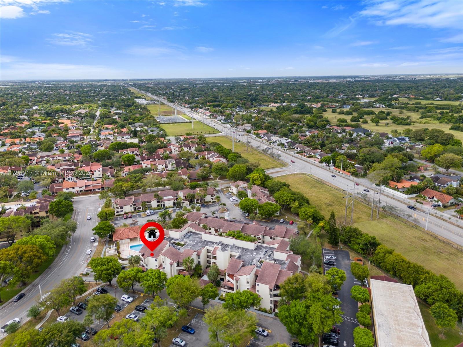Sellers are offering two flexible closing options: receive $5,000 toward closing costs or have the balance of the March 2028 assessment paid in full! This bright and spacious 3-bedroom, 2-bath condo is nestled in the sought-after Kenland Bend South community. Enjoy an open-concept living and dining area, a cozy kitchen, and a private balcony overlooking serene pool views. The primary suite features a walk-in closet and en-suite bath. The second bedroom is ideal for guests or a nursery, while the third bedroom (currently a den) offers space for a home office, media room, or can be converted back to a private bedroom. Enjoy in-unit laundry, additional private storage room, and Mediterranean-style community with a pool, clubhouse, and prime access to shopping, dining, schools, and highways.