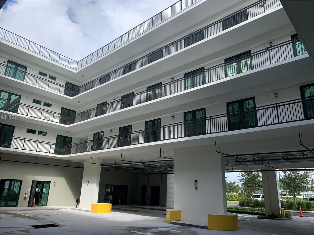 Photo of 4100 SW 64th Ave #309, Davie, FL 33314 (MLS # A11991171)