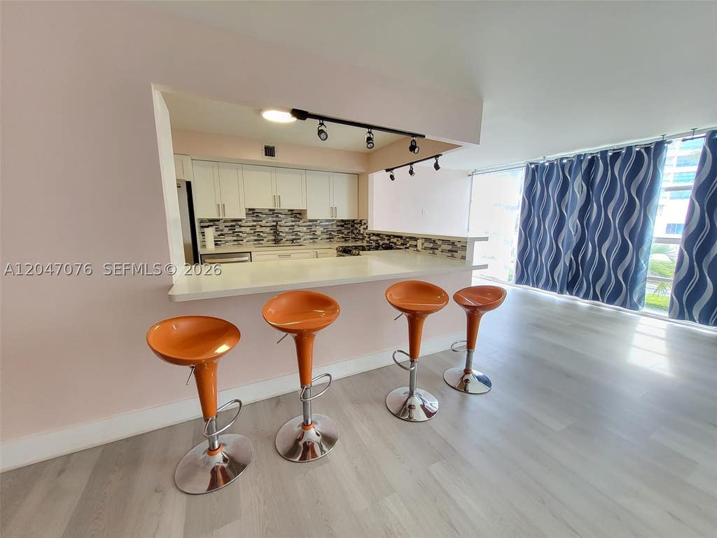 Photo of 501 Three Islands Blvd #310, Hallandale Beach, FL 33009 (MLS # A12047076)