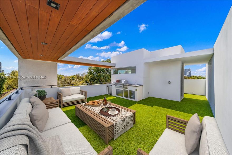 Welcome Home to the best Gated Townhome community in the heart of Coconut Grove. This ultra chic, move-in ready corner Townhome is filled with natural light & garden views from every corner. Featuring 2,300 SF & including  3 Bed / 3 Full Baths plus a 2 car garage. Open living format and wrap around terraces make entertaining a pure joy. Host friends on your own private Rooftop oasis with Summer Kitchen overlooking the Coconut Grove Skyline— year round sunrise and sunset views. Steps away from the Farmer’s Market, Cocowalk, and all of the grove’s romantic cafes and bistros. Minutes away from Trader Joe’s, Merrick Park, Brickell, Design District and Beyond. Live the ultimate lifestyle in Miami’s most vibrant and dynamic communities—This is what you’ve been waiting for.