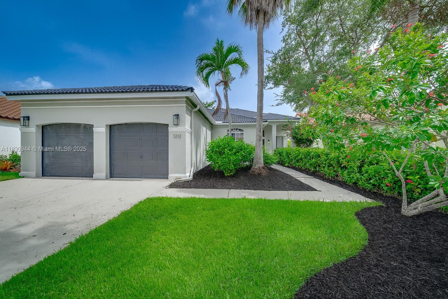 Welcome to your brand new dream home! This stunning one-story residence offers 4 spacious bedrooms and 3.5 luxurious bathrooms, fully and thoughtfully remodeled with no detail overlooked. Step inside and enjoy bright, open living spaces enhanced by elegant paneling and sleek hidden modern doors, creating a seamless and sophisticated aesthetic throughout. The designer kitchen features a stunning island, custom cabinetry, and an impressive coffee bar and wine station complete with a wine cooler, perfect for entertaining. The serene primary suite offers a spa-inspired bathroom and generous walk-in closet, while spacious guest suites ensure comfort for family and friends. Move-in ready and truly one-of-a-kind — this home embodies luxury, functionality, and modern elegance.