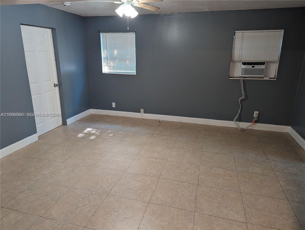 Photo of 5820 NW 14th Ct #1, Sunrise, FL 33313 (MLS # A11969596)