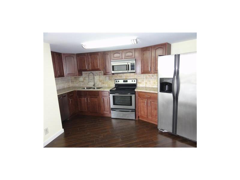 Check out this fully remodeled 1/1 unit located in the Three Islands Blvd neighborhood. This aparment includes Stainless Steel Appliances, Granite Counter Tops, Custom Itilian Kitchen Cabinets, Freshly Painted, Chocolate Wood Floors. Minutes away from Hal landale Beach, Aventura Mall, Gulf Coast Casino.