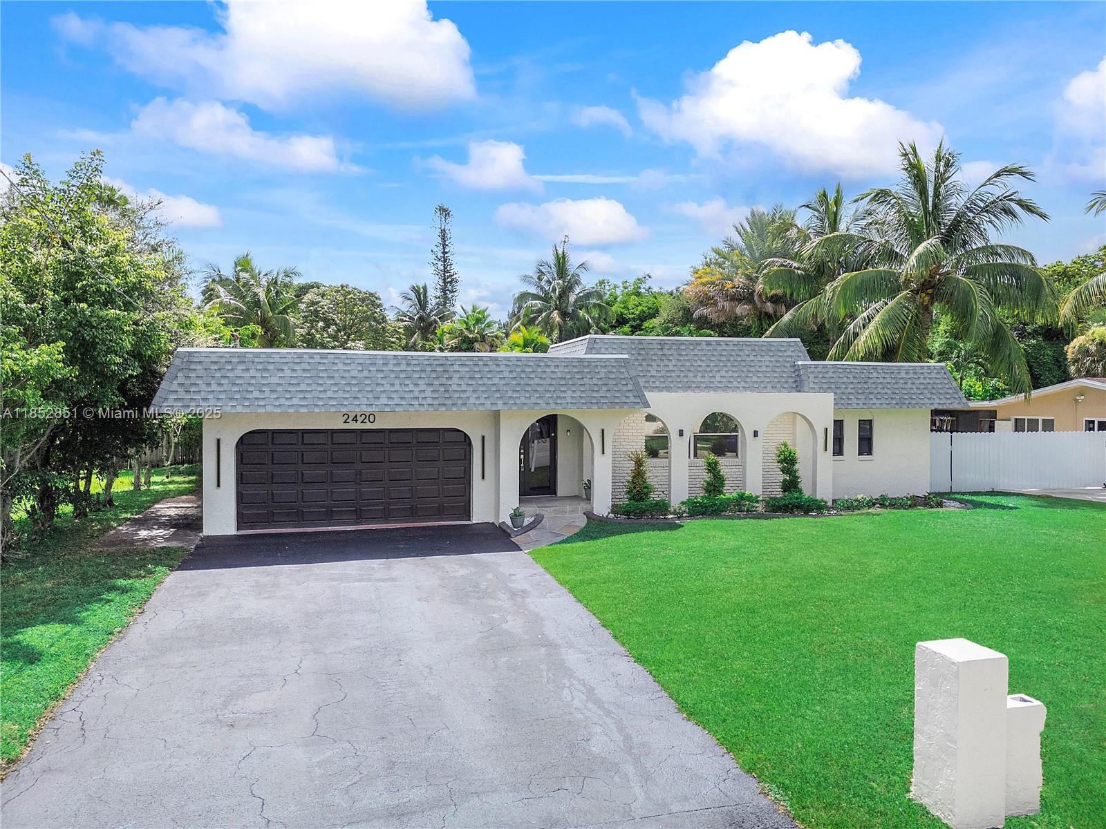 This gorgeous home blends classic charm with the highest standards of modern decor that will take your breath away! From the moment you enter you know this one is special! The seller has spared no expense to create an exceptional home with elegant touches everywhere. You are drawn to the eye catching gourmet kitchen with cooking island, custom cabinets and ultra modern countertops and accents. Features include: New Roof, New AC, dazzling fully modern bathrooms, impact windows and custom flooring throughout. A flexible floor plan and generous sized bedrooms will separate this one from the rest. A tropical oasis backyard on a large fully fenced 12,000 foot lot that features a gorgeous pool and lots of privacy makes this the perfect retreat. No hoa fees and perfect for primary use or airbnb.