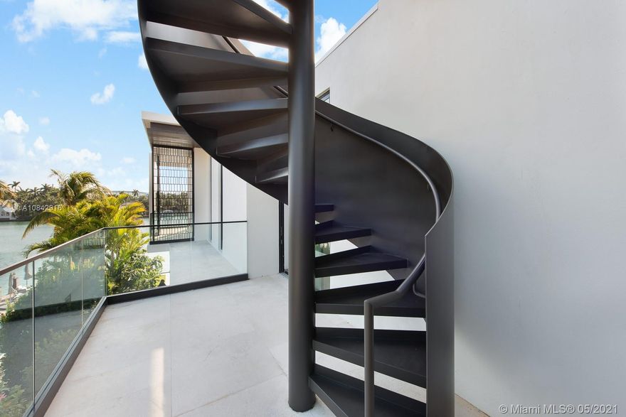 Stunning new contemporary luxury waterfront villa on the coveted Hibiscus Island. Designed by Borges Architecture & Designer, Tara Nia, you’ll enjoy beautiful 360-Degrees views of the iconic Miami skyline. This fully custom, awe-inspiring, smart home features an Ornare kitchen, sleek entertainment bar, floor-to-ceiling wine cellar. A floating sculpture staircase takes you to the spacious master bedroom and marble bathroom with unique Mia Cucina 'His & Hers' closets. Gorgeous contrast of wood, concrete, and stone elements provides a tropical warmth and calmness. Other amenities include floor-to-ceiling sliding doors, rooftop terrace, infinity pool, 2-car collectors garage, commercial grade elevator, and more!