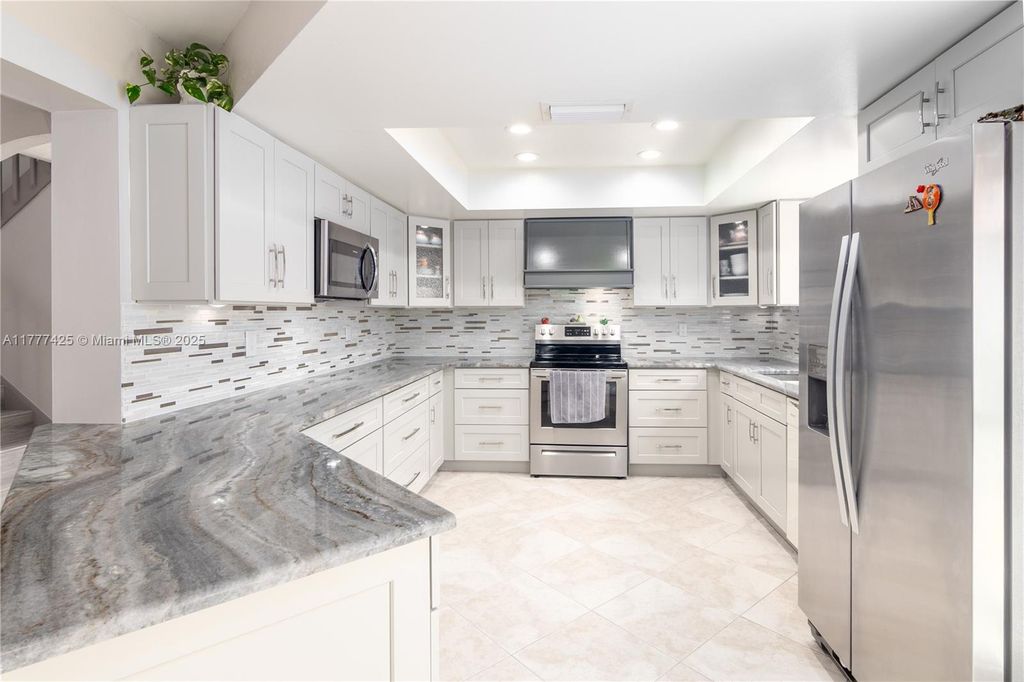Photo of 10263 Islander Dr, Boca Raton, FL 33498 (MLS # A11777425)