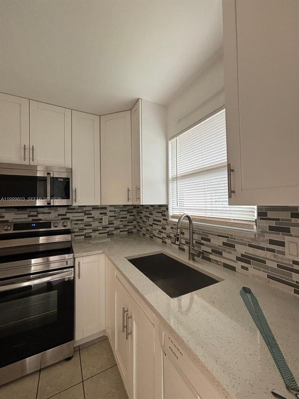 Photo of 21904 Lake Forest Cir #203, Boca Raton, FL 33433 (MLS # A11999603)