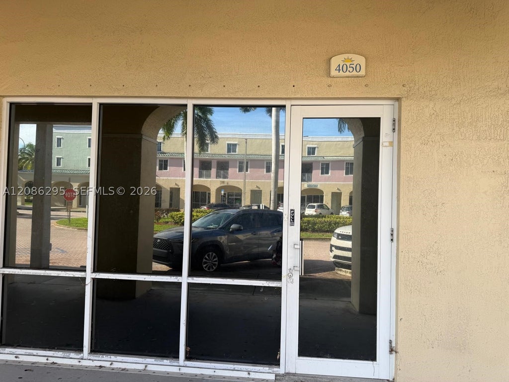 Photo of 3401 N State Road 7 #B-12, Lauderdale Lakes, FL 33319 (MLS # A12086295)