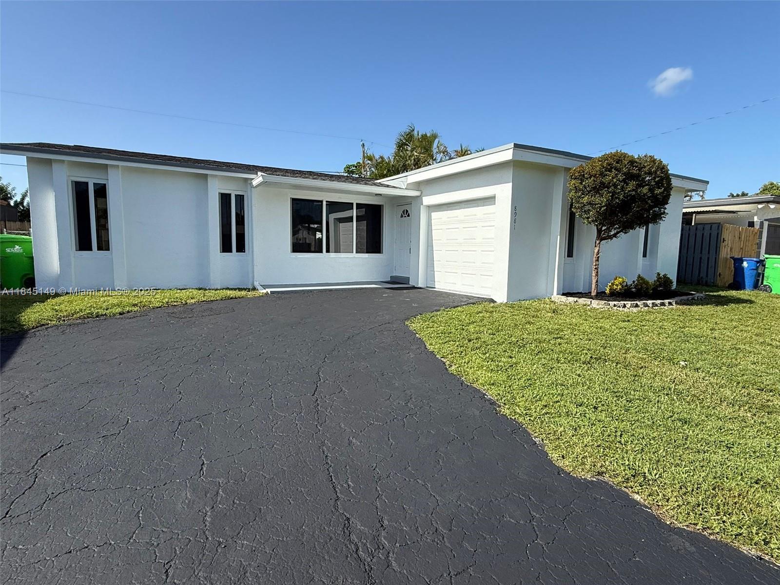 8981 NW 24th St, Sunrise, FL, 33322/$560,000 1 8981 NW 24th St