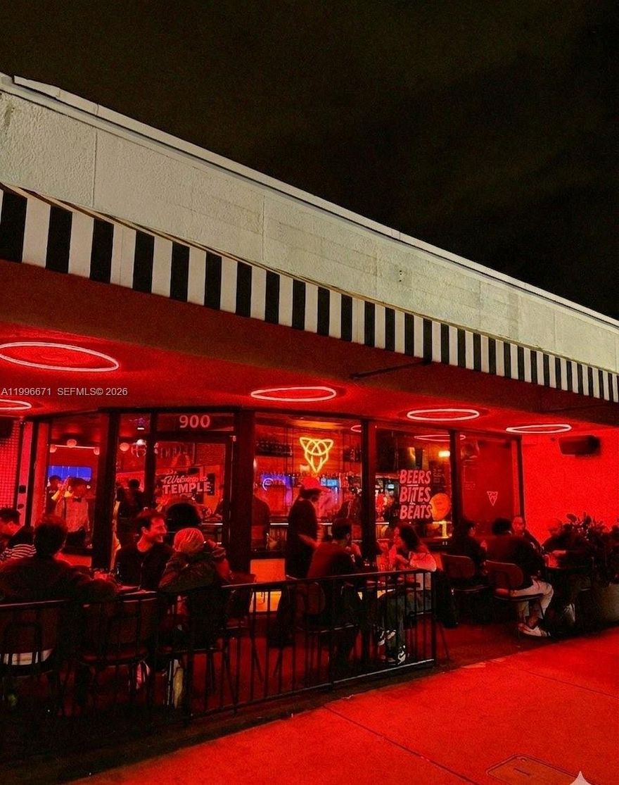 Rare opportunity to acquire a second-generation restaurant/bar space in the heart of Miami Beach's residential corridor on Alton Road. This highly visible corner location offers what few South Beach properties can — dedicated on-site parking, an invaluable amenity that sets this space apart from the competition. The build-out features a well-appointed interior along with a charming outdoor seating area, ideal for alfresco dining or a vibrant bar scene. Currently operating as a successful late-night bar with a proven track record.