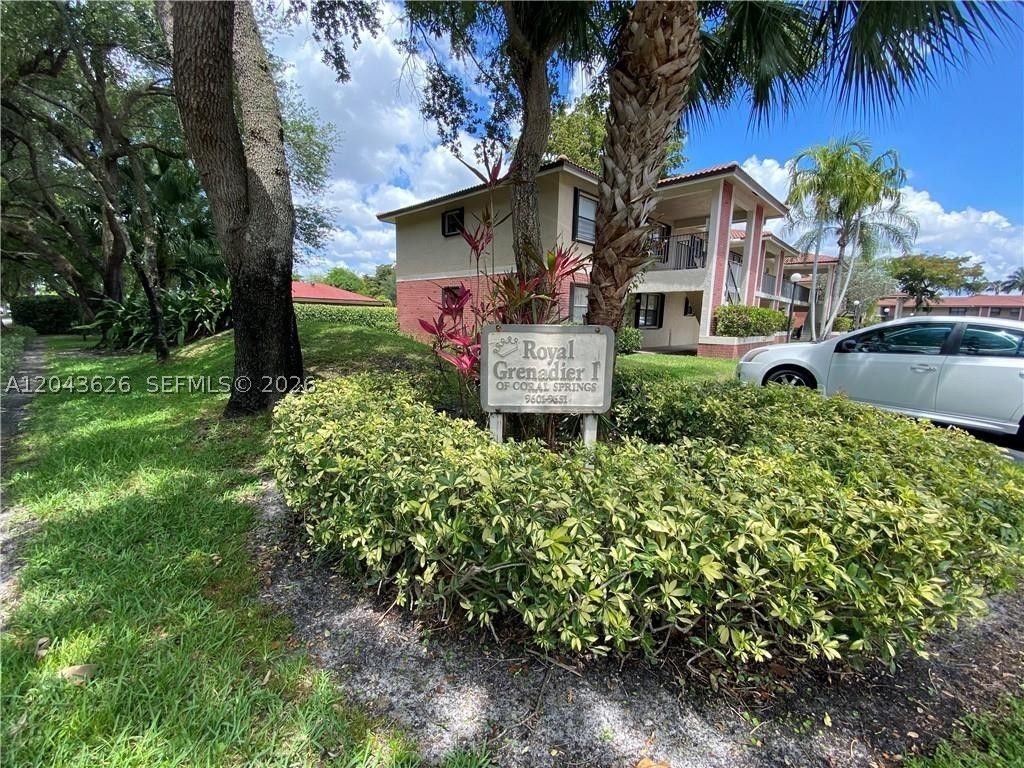 Photo of 9643 NW 4th St #5B, Coral Springs, FL 33071 (MLS # A12043626)