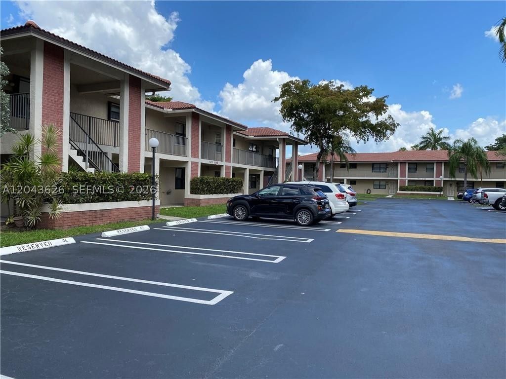 Photo of 9643 NW 4th St #5B, Coral Springs, FL 33071 (MLS # A12043626)