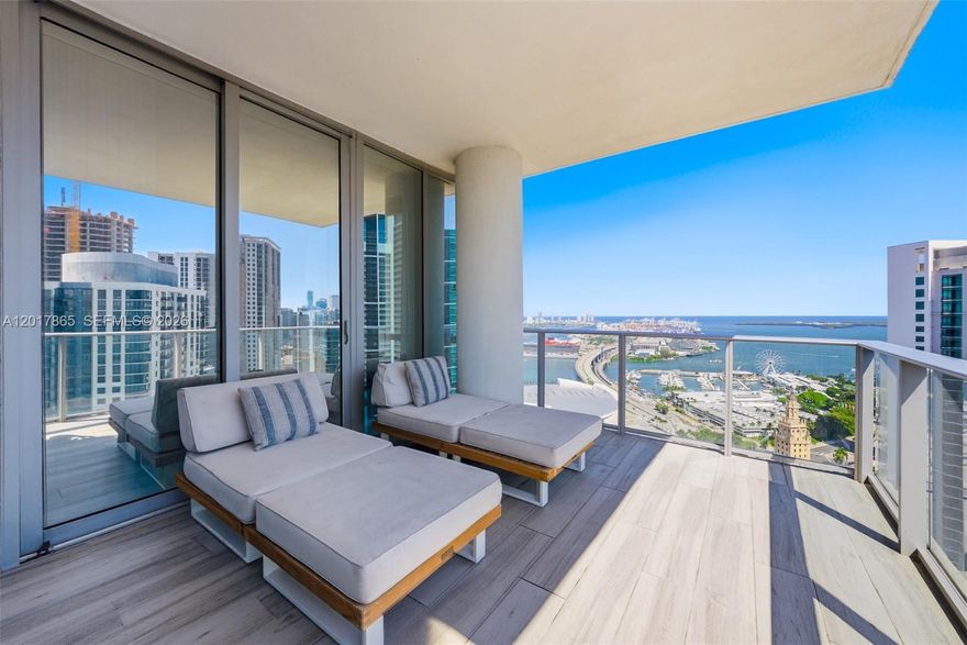 Never lived in full time nor rented, and impeccably finished, this exceptional corner residence at Paramount Miami Worldcenter showcases sweeping direct ocean views from one of Miami’s most amenity-rich luxury towers. This pristine sky residence offers 3 bedrooms plus an oversized den easily convertible into a 4th bedroom, 4 full bathrooms, soaring 10-foot ceilings, expansive living and entertaining areas, private elevator foyer, spacious laundry room, custom walk-in closets, and a private in-law suite with separate entrance. Rarely available, the residence also includes 2 dedicated side-by-side extra-wide parking spaces.
Designed for elevated modern living, Paramount delivers an unrivaled resort lifestyle with over 40 world-class amenities, including multiple resort-style pools, sunrise and infinity pools, skydeck lounge, observatory, state-of-the-art fitness center, boxing studio, aerobics and yoga studios, basketball and racquetball courts, tennis courts, soccer field, jogging path, spa and salon with treatment rooms, steam showers, outdoor bath gardens, relaxation lounges, conservatory, outdoor lounges and gardens, summer kitchens with BBQ areas, poolside bungalows and daybeds, floating seating pods, business center, game room, recreation lounge, demo kitchen, children’s playroom, jam room with recording studio, dog park, food market, valet, and direct access to Miami Worldcenter — moments from world-class dining, shopping, entertainment, museums, and the waterfront.