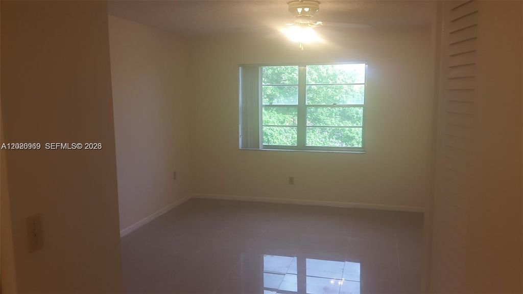 Photo of 4384 NW 9th Ave #18-3B, Deerfield Beach, FL 33064 (MLS # A12020969)