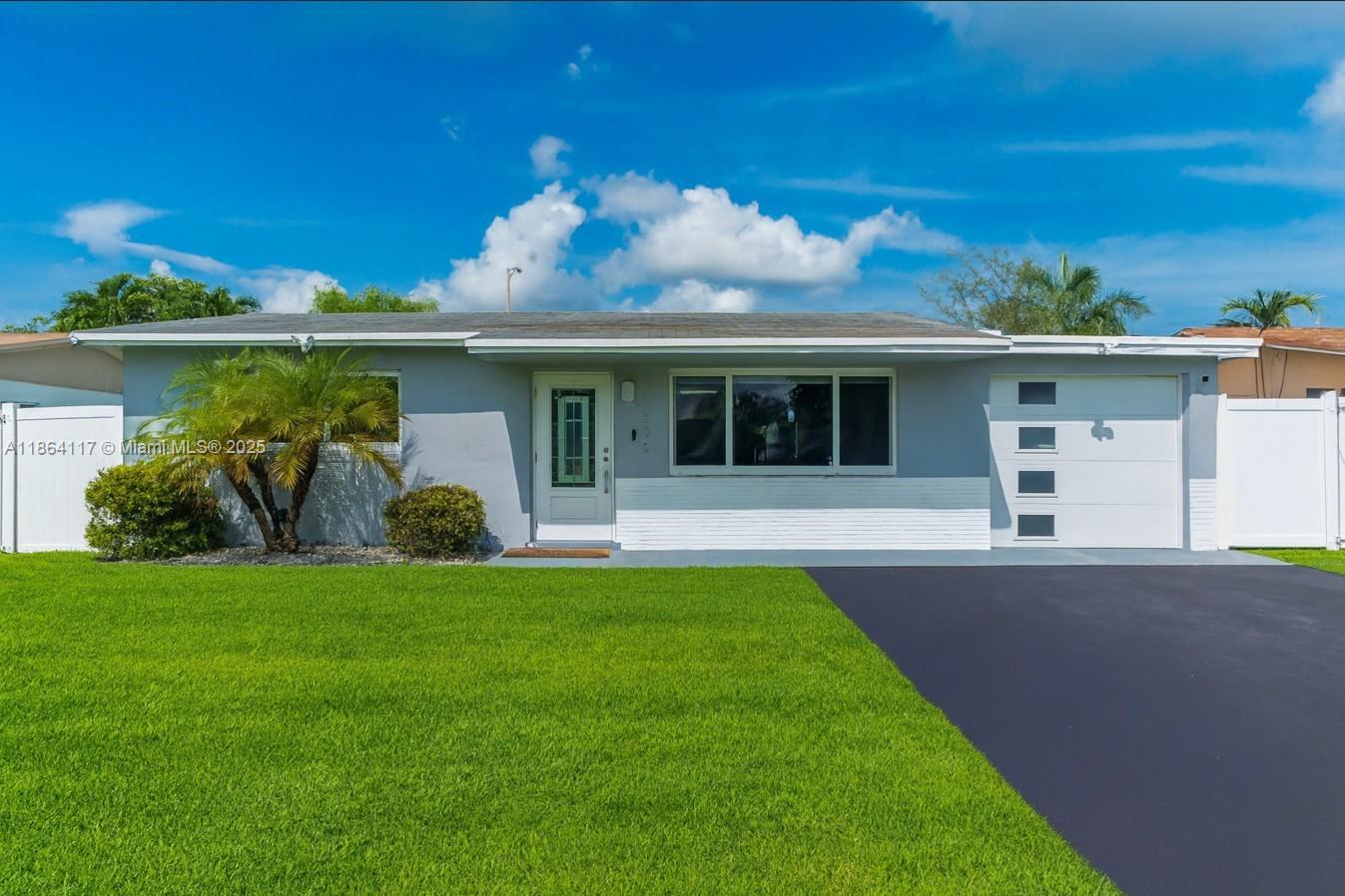 Completely remodeled 3/2 single-family home in the heart of Cooper City w/ NO HOA. This stunning residence features luxury vinyl flooring throughout, impact windows, recessed lighting, & modern zebra blinds for your convenience. The open-concept kitchen boasts sleek stainless-steel appliances, white shaker cabinets, quartz counters, & soft-close drawers. Enjoy a spacious layout w/ two living areas, one perfect for a 4th bedroom, home office, or game room. The master suite offers two walk-in closets & a resort-style bath w/ elegant finishes. Abundant natural light flows through every room. Spacious laundry room in the home for your convenience. The property is fully enclosed with PVC fence for privacy. Full 1 car garage. A covered outdoor patio with ceiling fans, perfect for entertaining.