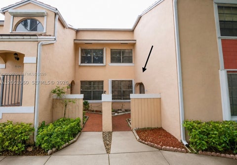 Photo of 11856 NW 11th St #11856, Pembroke Pines, FL 33026 (MLS # A12053060)